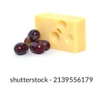 A Piece Of Cheese With Grape On ...