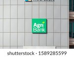 Small photo of LUQA, MALTA - OCTOBER 26, 2019: Headquarters office of the AgriBank PLC at the Malta International Airport with a green logo at the white wall of a building