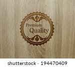 premium quality on wood texture. | Shutterstock . vector #194470409