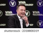 Small photo of PARIS, FRANCE - June 16, 2023: Elon Musk, founder, CEO, and chief engineer of SpaceX, CEO of Tesla, CTO and chairman of Twitter, Co-founder of Neuralink and OpenAI, at VIVA Technology (Vivatech)