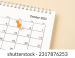 Close up wooden pin marked on Friday 13 October calendar 2023.