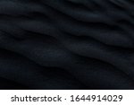 Dark, black, blue abstract sand pattern. Texture background image.