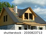Attic Roofing Construction. A...