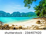 Exotic beach with blue sky, blue water and white sand in the background, South Asia