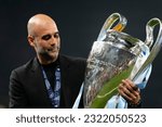 Small photo of Pep Guardiola head coach of Manchester City celebrates after winning the UEFA Champions League 22-23 final match between FC Internazionale and Manchester City FC at Atatuerk Olympic Stadium on June 10 23
