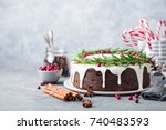 Christmas fruit cake, pudding on white plate. Close up. Copy space.