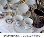 Some Cups Saucers Teapots And...