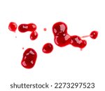 Drops and stains of red berry...