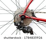 Bicycle cassette and rear derailleur on white background
