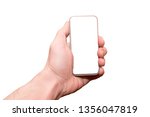 human hand holds a modern... | Shutterstock . vector #1356047819