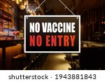No Vaccine No Entry Sign at a bar, tavern or pub. Proof or vaccination required to enter a shop or business establishment.