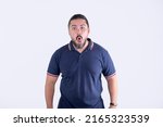 Small photo of A dumbfounded and surprised man with a jaw dropping expression. Speechless and awestruck. Isolated on a white background.