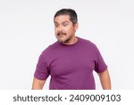 Small photo of Facial reaction of a middle aged man looking perplexed or flummoxed. Looking dazed, confused at something. Experiencing brain fog. Isolated on a white background.