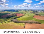 Small photo of Fields and Meadows over English Village, Berry Pomeroy, Devon, England, Europe