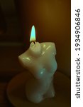 Handmade woman torso melted wax candles with aromatic oils.
Female figure bust soy wax candle DIY production of aromatic decorative elements.