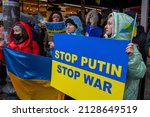Small photo of Ukrainian demonstrators, holding banners and Ukrainian flags, protested Russias intervention in Ukraine in front of the Russian Consulate General on Istiklal Street,Istanbul,Turkey on February 24,2022