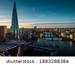 Aerial View over Shard, London Bridge Station, Thames River during sunset