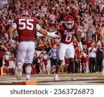 Small photo of Sept 16, 2023:NCAA Football, BYU 38:31 Ark- Razorbacks OL Beaux Limmer (55) congratulates RB AJ Green (0) on his touchdown during the game at Razorback Stadium, Fayetteville, AR.