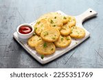 Small photo of Healthy Cauliflower hash browns on white wooden board