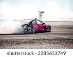 pink car drifting, Blurred image diffusion race drift car with lots of smoke from burning tires on speed track