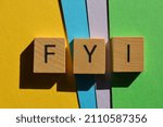Small photo of FYI, acronym For Your Information in wood alphabet letters isolated on colourful background