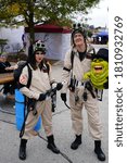 Small photo of Manitowoc, Wisconsin / USA - October 5th, 2019: Couple dressed in ghostbusters costumes attended windigo fest halloween festival.
