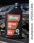 Small photo of Fond du Lac, Wisconsin USA - March 6th, 2021: O'Reilly SEA 5w-20 motor oil for 2002 Ford Taurus.