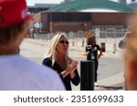 Small photo of Milwaukee, Wisconsin USA - August 23rd, 2023: United States Representative Marjorie Taylor Greene gave interviews with the press and media and interacted with Trump supporters at the Fiserv Forum.