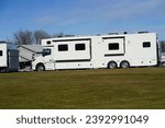 Small photo of Fond du Lac, Wisconsin USA - November 12th, 2023: Renegade Valencia 38RB super c RV sitting outside to be sold.