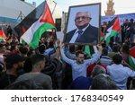 Small photo of Palestinian supporters of Fatah movement go out in a march in support of the joint conference between Hamas and Fatah in Ramallah against plans to annex Israel to the West Bank, on July 2, 2020.
