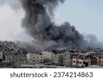 Small photo of Smoke rises after Israeli air strikes near the border east of the city of Rafah in the southern Gaza Strip, on October 12 2023.