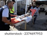 Small photo of Wounded Palestinians were transferred to Al-Najjar Hospital after being targeted by Israeli warplanes, in the city of Rafah, south of the Gaza Strip, on October 13 2023.