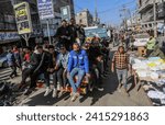 Small photo of Palestinians crowd at a local street market in Rafah. UNRWA said the population of the city of Rafah has nearly quadrupled to more than 1.300 million people, in Gaza Strip, on January 20, 2024.