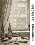 Small photo of MOSCOW, RUSSIA - JULY 14,2019: Soviet still life. Old kitchen, bottles of beer "Zhigulevskoe", vobla and the newspaper "Komsomolskaya Pravda".