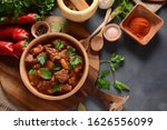 Goulash traditional Hungarian Beef Meat Stew or Soup with vegetables and tomato sauce, Comfort winter or autumn foods concept