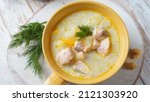 Creamy fish soup with salmon, potatoes, onions , carrots, dill and celery . Kalakeitto- traditional dish of the Finnish cuisine or Russian  Ukha Fish Head Soup. Healthy Food Concept. Omega -3