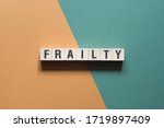 Small photo of Frailty word concept on cubes