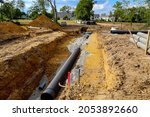 Small photo of public works, construction of subdivision, passage of pipes