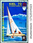 Small photo of 02.09.2020 Divnoe Stavropol Territory Russia postage stamp Equatorial Guinea 1972 Olympic Games - Munich, Germany Events in Kiel Star sailing yacht with a yachtsman