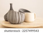Ceramic crockery and craft pottery cups. Handicraft clay earthenware bowls