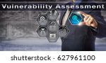 Small photo of Blue chip security consultant initiating Vulnerability Assessment via virtual control matrix. Information technology and business concept for identifying and quantifying threats to an IT system.
