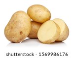 Raw potatoes isolated on white...