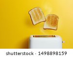 Slices of toast jumping out of...