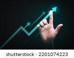 Businessman's hand pointing up arrow symbol, business efficiency development and growth concept, financial and economic success sign, ahead of business competitors, industry leadership.