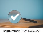 magnifying glass and check mark icon,show check the authenticity of the document,concept of rules of conduct rules and policies company regulations Terms and Conditions