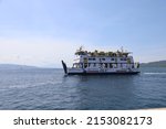 Small photo of ferry at sea. Ferry boat crossing the Ketapang port, Banyuwangi to Gilimanuk Bali. Ferry traffic in the Java Sea during Lebaran homecoming in Surabaya, Indonesia on May 6, 2022
