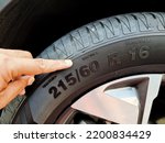 Side view of the tire with the indication of the width of the tire, the height and diameter of the wheel. tire code that includes the temperature code, speed limit and expiration date of the tire and