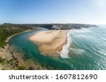 Beautiful seascape and landscape from ocean and river of Odeceixe beach village in the south of Portugal. Westcoast of the Algarve, in the Costa Vicentina Natural Park. Travel, holidays, vacation feel