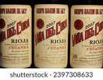Small photo of Viersen, Germany - May 9. 2023: Closeup of Bodega Baron de Ley spanish Rioja Vina del cura red wine bottles (focus on center)