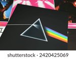 Small photo of Viersen, Germany - January 9. 2024: Closeup of Pink Floyd best selling album vinyl record cover the dark side of the moon from 1973 (focus on center)